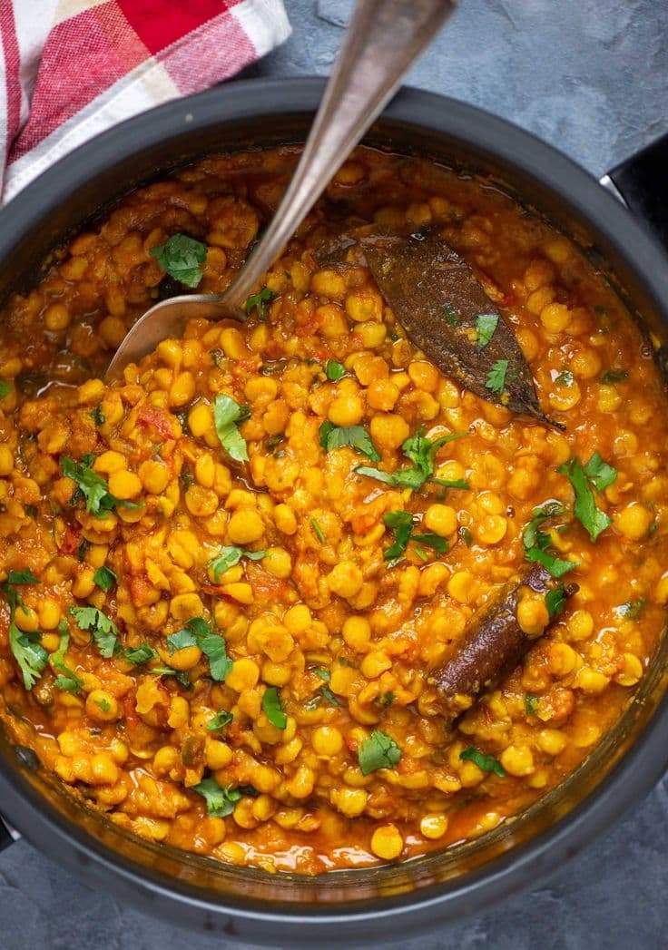 Spicy curry garnished with cilantro